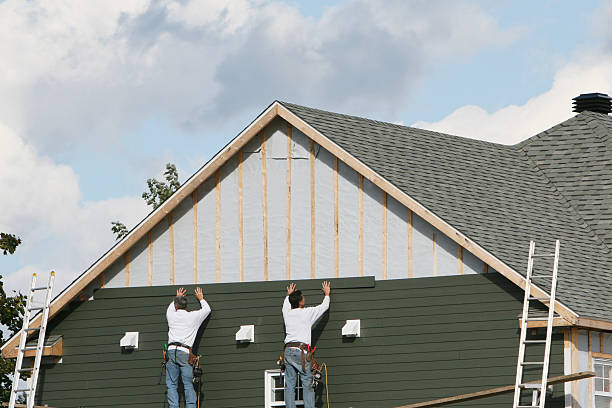 Professional Siding Contractor technician working in Foster, VA